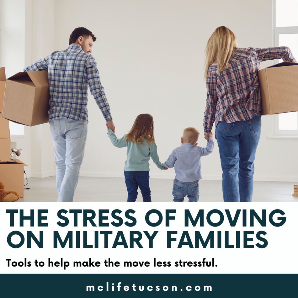 Image of family of four moving into new home. The Mom and Dad are on holding hands with their daughter and son while holding moving boxes. The room they are entering is painted white and not decorated.