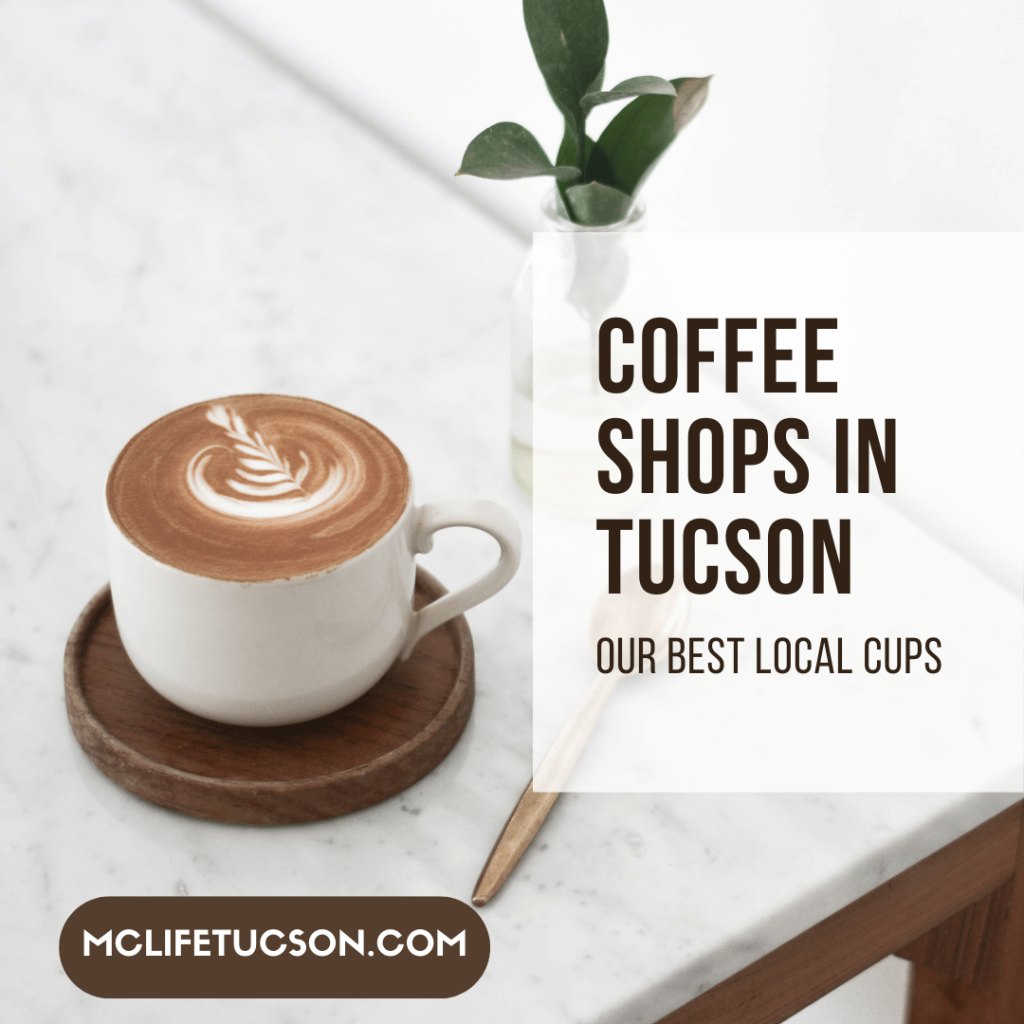 Image of a latte in white mug on a marble topped table.