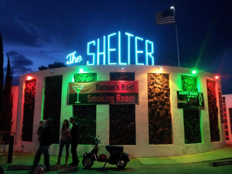 image of the shelter cocktail lounge lit up at night. 