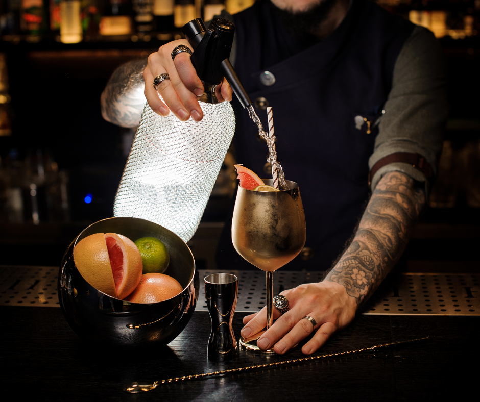 Bartender creating a fruit cocktail in a secret bar